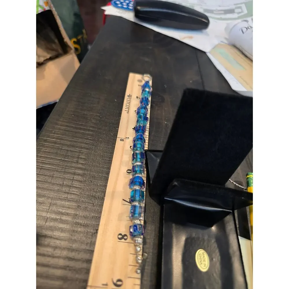 Bulk blue bracelets, one nicely beaded